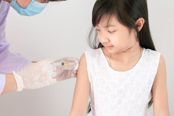 child getting injected 